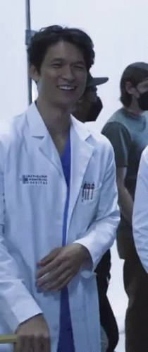Man in White Lab Coat Smiling