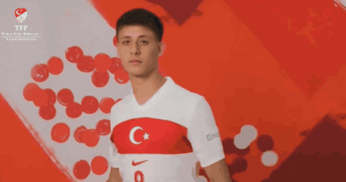 Man In White Nike Shirt With C And Star GIF