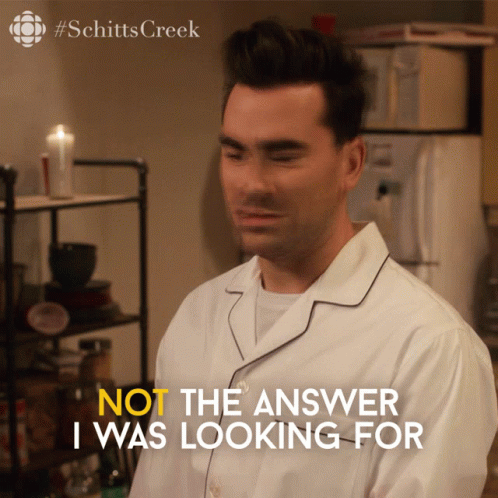 Man in White Pajama Shirt Saying Not the Answer I Was Looking for