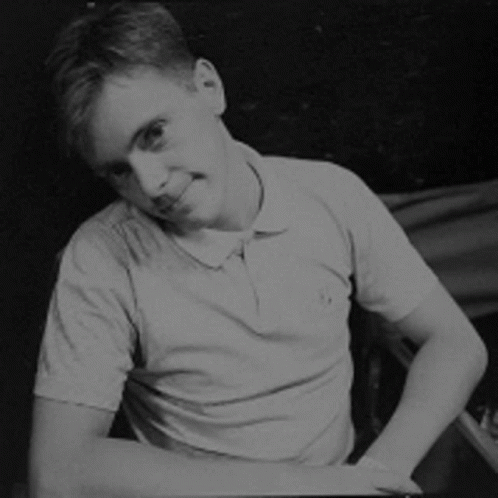 Man in White Polo Shirt Black and White