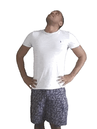 Man in White Polo With Hands on Hips