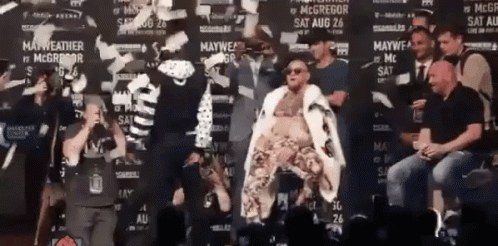 Man In White Robe At Mayweather Wall GIF