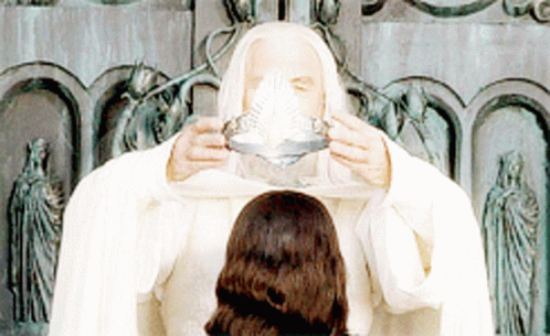 Man In White Robe Drinking From Silver Bowl GIF