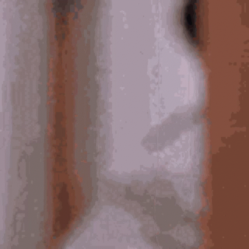 Man in White Robe Looking Out