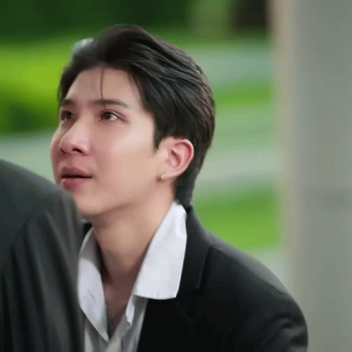 Man in White Shirt and Black Jacket