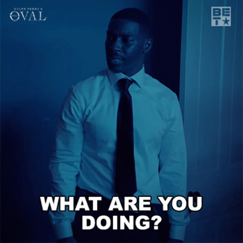Man in White Shirt and Black Tie Asking What Are You Doing