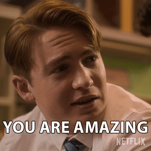 Man in White Shirt and Blue Tie Saying You Are Amazing