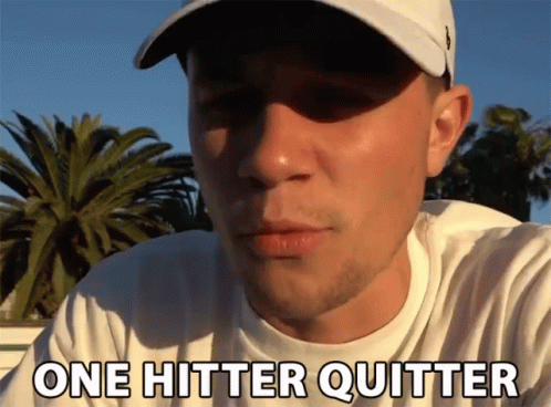 Man in White Shirt and Hat Saying One Hitter Quitter