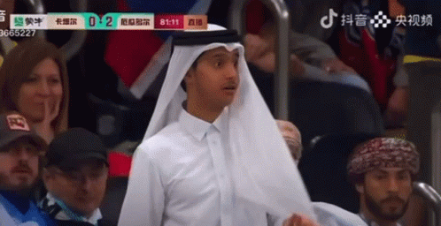Man In White Shirt And Head Scarf Watching Game 0-2 GIF