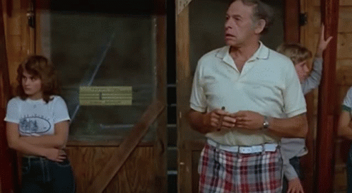 Man In White Shirt And Plaid Shorts GIF