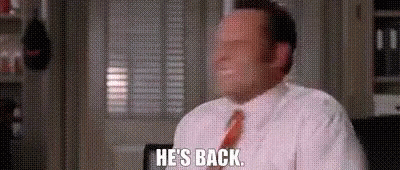Man In White Shirt And Red Tie Saying He's Back GIF