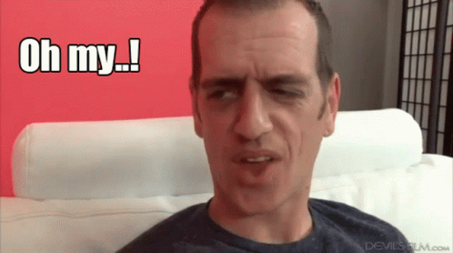 Man In White Shirt And Red Tie Saying He's Back GIF