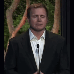Man In White Shirt And Suit Eyes Closed At Microphone GIF