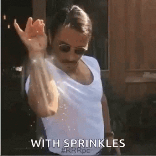Man in White Shirt and Sunglasses Raising Hand