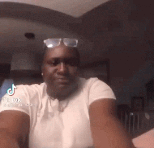 Man in White Shirt and Sunglasses Taking Selfie