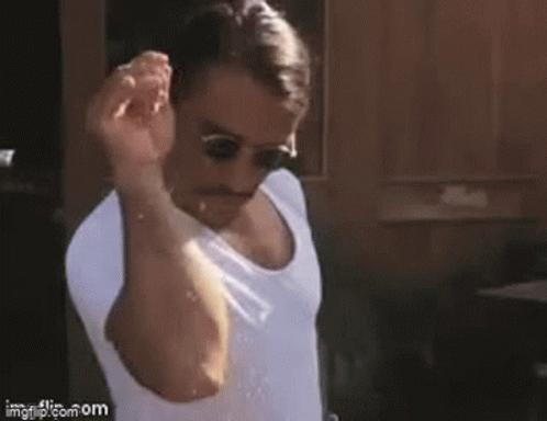 Man in White Shirt and Sunglasses with Ravenclaw Tattoo