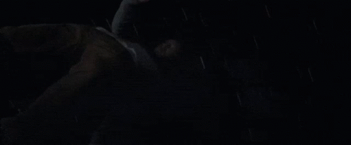 Man In White Shirt And Tie Floating In Space GIF