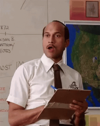 Man in White Shirt and Tie Holding Clipboard