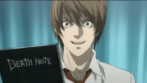 Man in White Shirt and Tie Holding Death Note