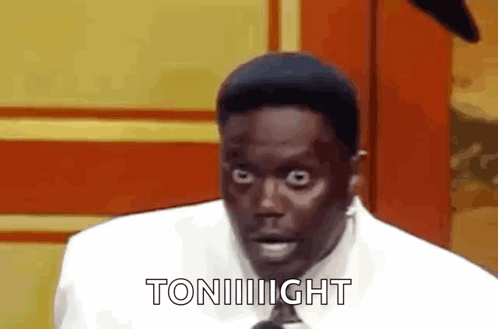 Man in White Shirt and Tie Saying Tonight