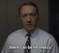 Man In White Shirt And Tie Says No Mercy GIF