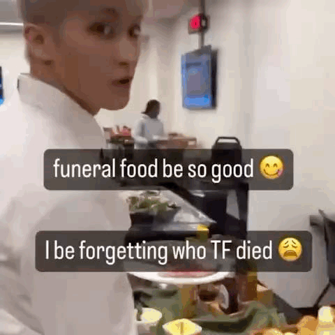 Man In White Shirt At Table With Plate Of Food GIF