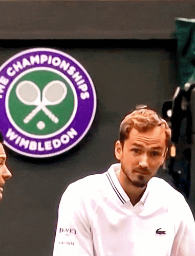 Man In White Shirt At Wimbledon Sign GIF