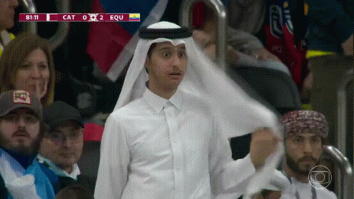 Man In White Shirt Before Scoreboard Saying Equ GIF