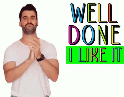 Man in White Shirt Clapping in Front of Well Done I Like It Sign