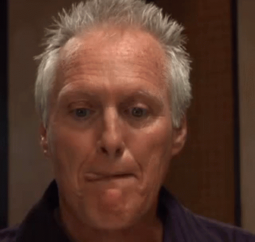 Man in White Shirt Crying Eyes Closed Mouth Open