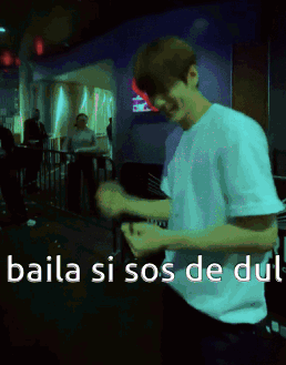 Man in White Shirt Dancing Baila Si Sos De Du