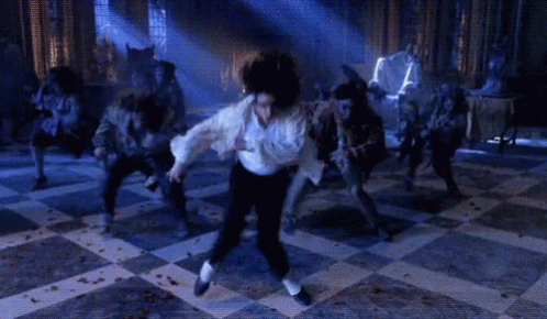 Man in White Shirt Dancing Before Werewolves