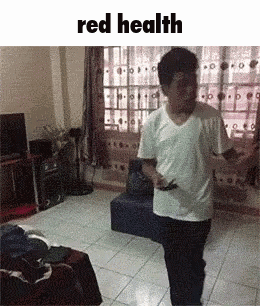 Man in White Shirt Dancing Red Health