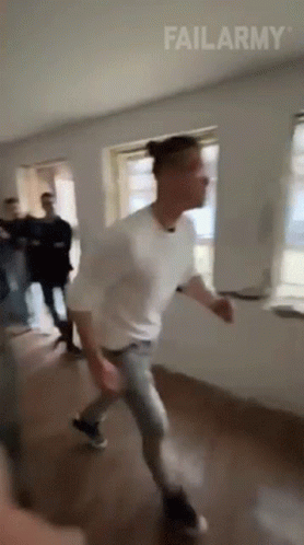 Man in White Shirt Dancing With FailArmy Logo