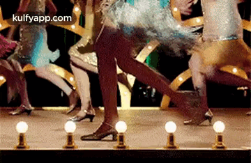 Man in White Shirt Dancing with Hand in Air