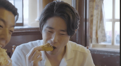 Man In White Shirt Eating Chicken Nugget GIF