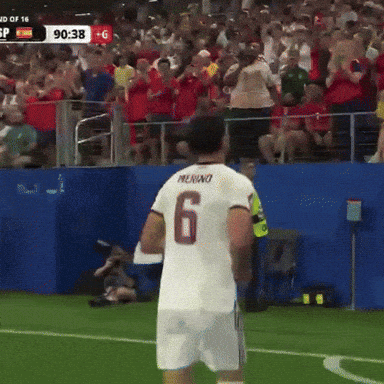 Man in White Shirt Giving Middle Finger Soccer Match