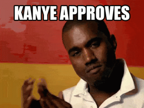 Man in White Shirt Giving Thumbs Up Kanye Approves