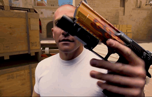 Man in White Shirt Holding Gun With Glock Sticker
