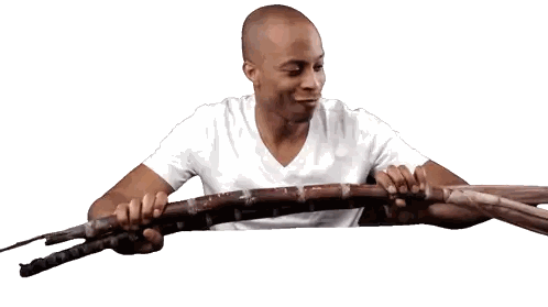 Man in White Shirt Holding Knife