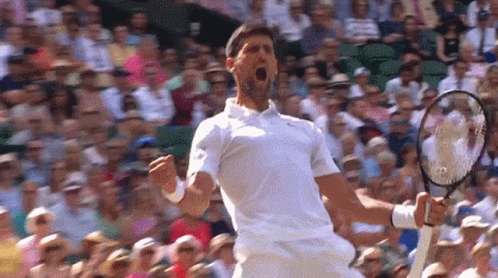 Man In White Shirt Holding Tennis Racquet GIF