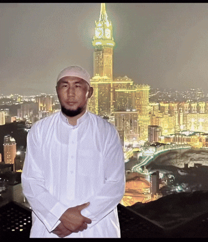 Man In White Shirt In Front Of Clock Tower Saying Clock Tower GIF