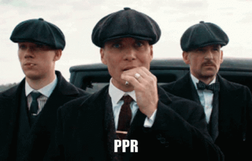 Man In White Shirt In Front Of Jack Ryan Wall GIF