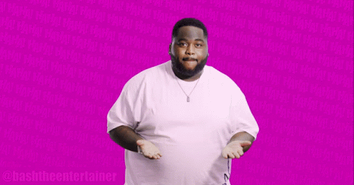 Man in White Shirt in Front of Pink Background