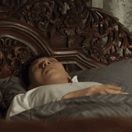 Man in White Shirt Lying in Bed
