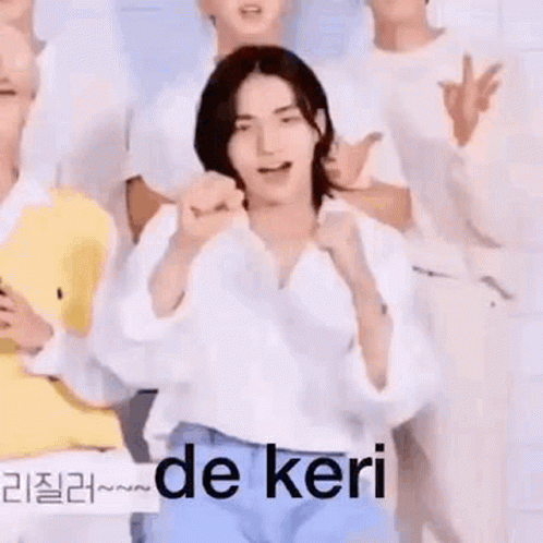 Man In White Shirt Making Fist Gesture GIF