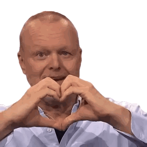 Man in White Shirt Making Heart