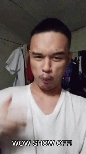 Man in White Shirt Making Wow Show Off Face