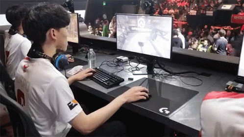Man in White Shirt Number 2 Playing Video Game