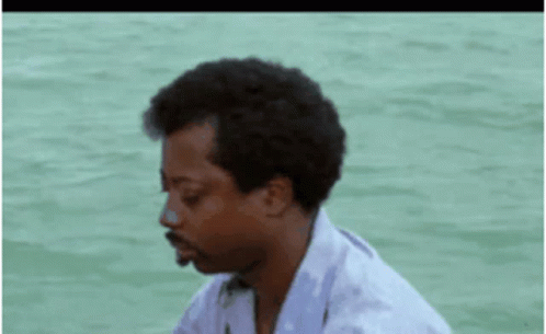 Man in White Shirt on Boat